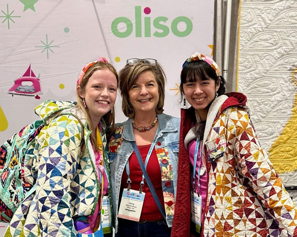 Amy photo with friends Beth and Angie at QuiltCon wearing her Jean Jacket embellished with Treasured Threadz™ Quilt Con Recap - Amy + People