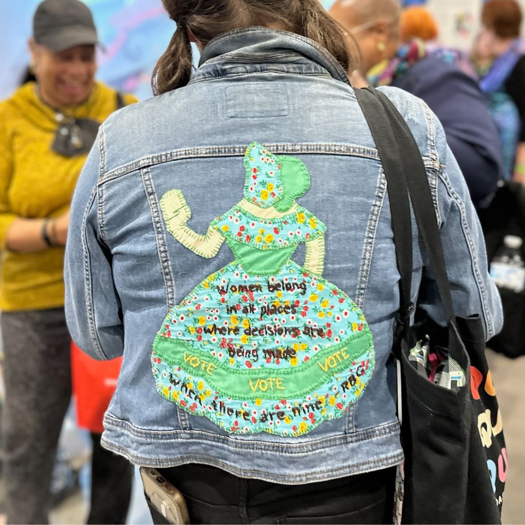 QuiltCon Round Up - Maddie Kertay The Badass Quilter Jacket with RGB quote