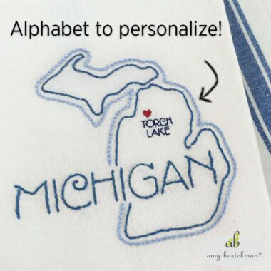 Michigan Embroidery State Towel, Alphabet to personalize showing Torch Lake with Heart Shape